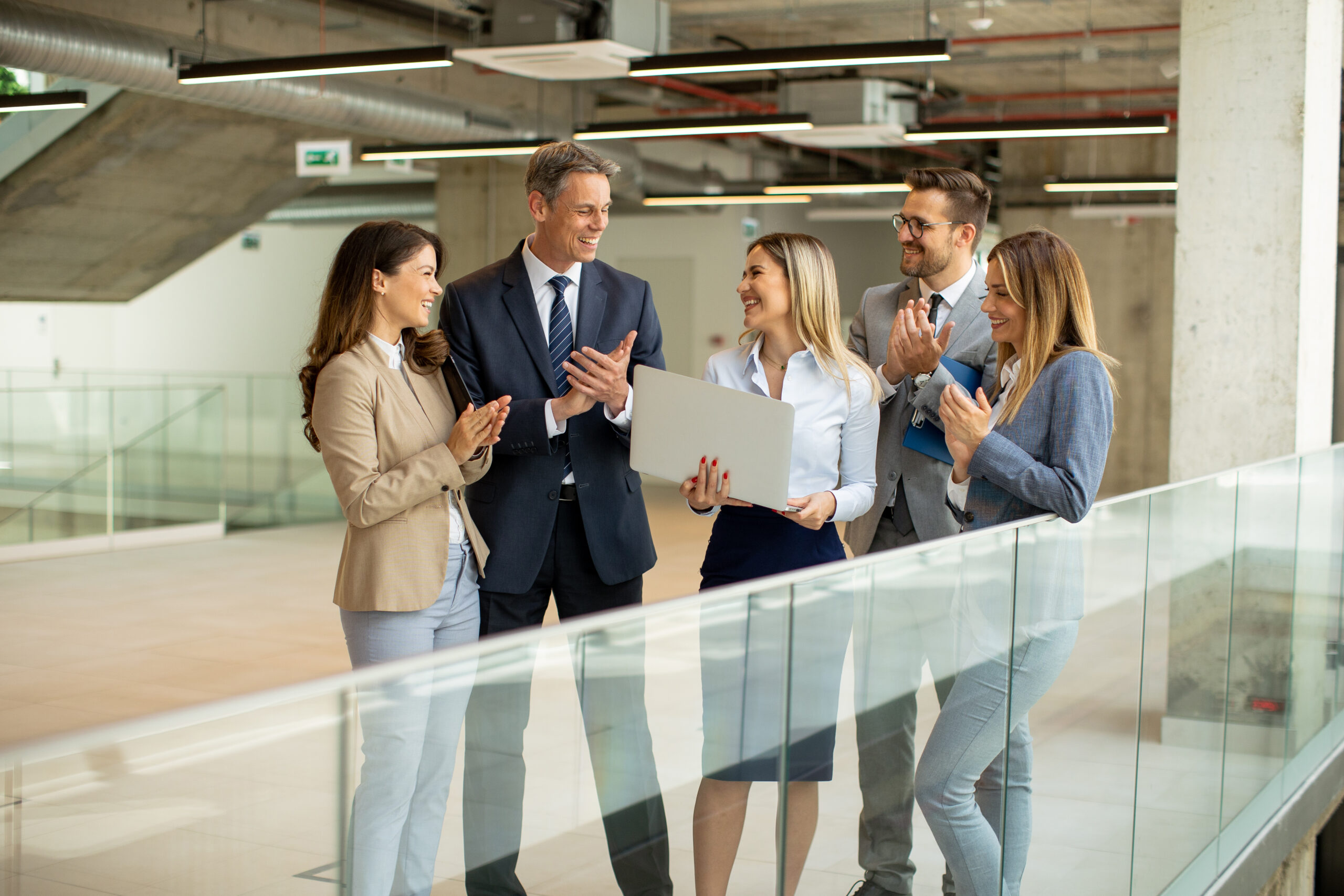 Startup team working in office corridor