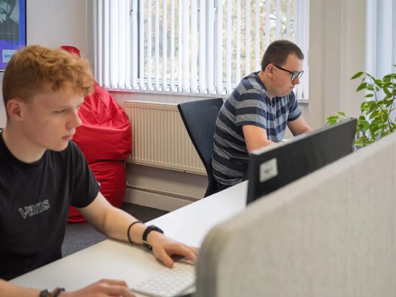 Fly High Web team working together in the office